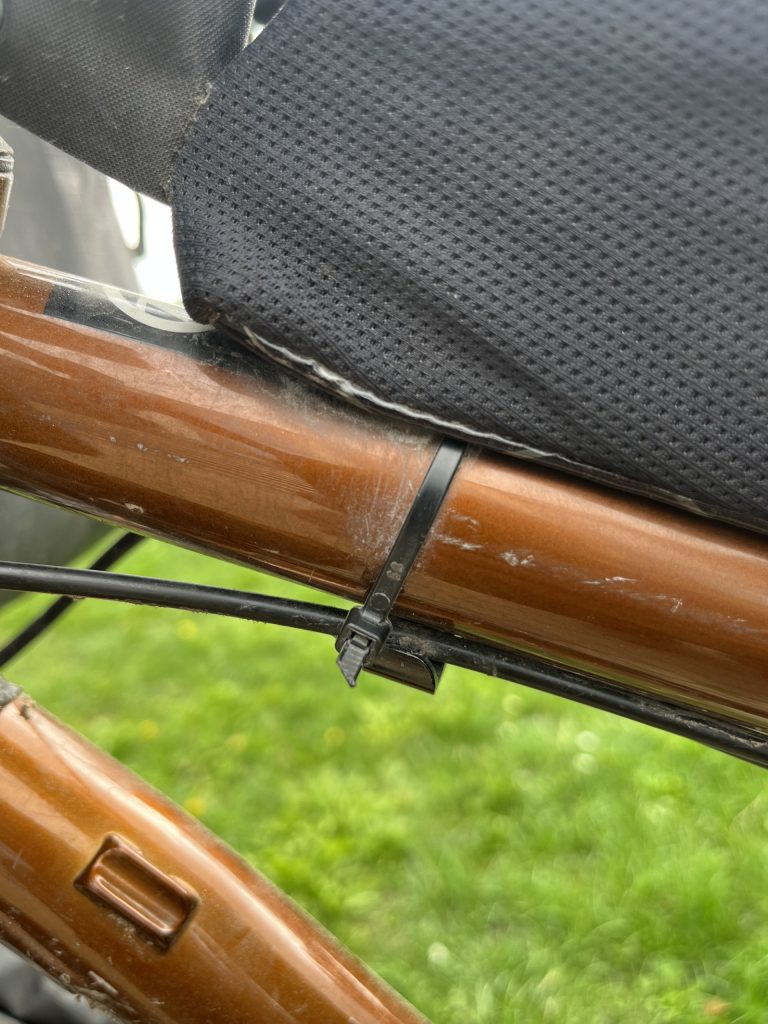 Cable ties in action holding brake cables 
