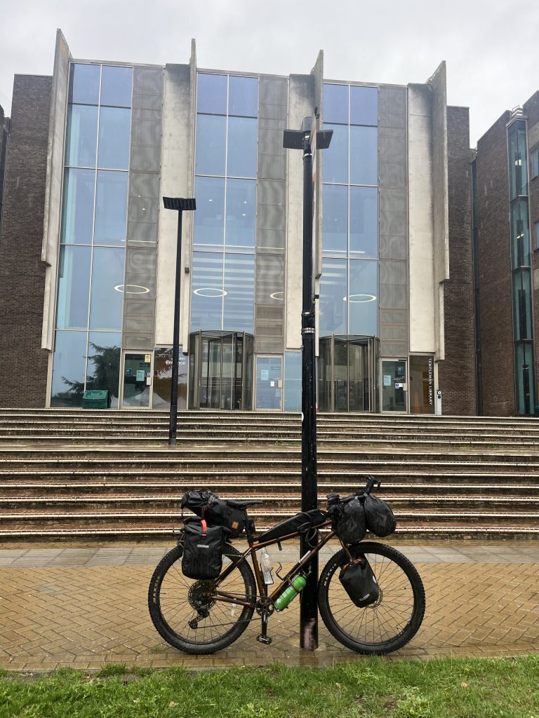 Loaded touring bike outside the library 
